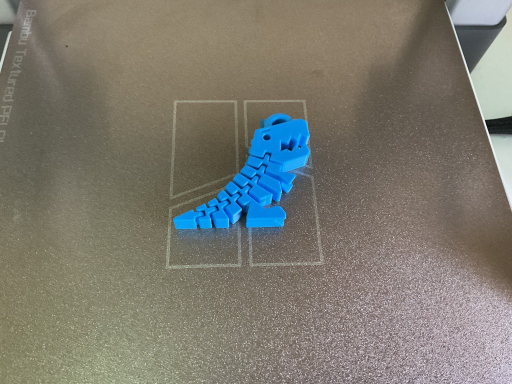 Blue articulated dinosaur 3D print